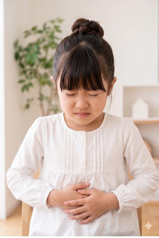 お腹の不調に悩む小学生の女の子
